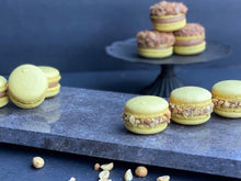 Load image into Gallery viewer, Peanut Butter Banana Macarons
