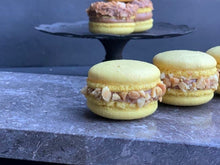 Load image into Gallery viewer, Peanut Butter Banana Macarons
